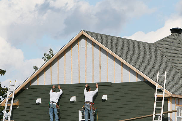 Professional Siding technician working in West Point, NY